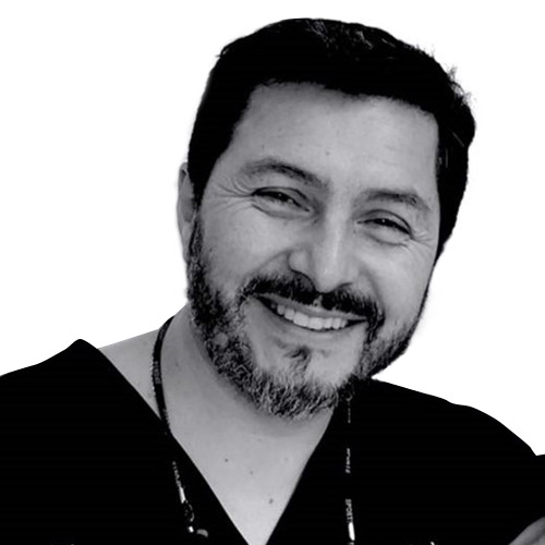 Dr.  Carlos Cáceres